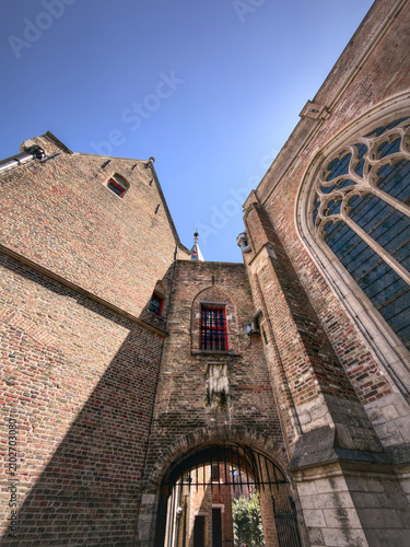 Historic Brick Architecture and Archway in Bruges, Belgium