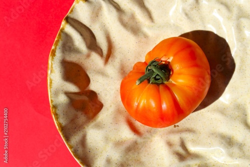 tomato on a wooden background