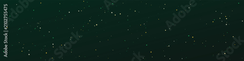 Fotografi Abstract glittering golden particles suspended in deep green background represen