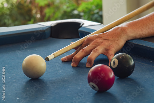 Photography Open bridge hand holding cue stick aiming carefully cue white billiard balls, ca