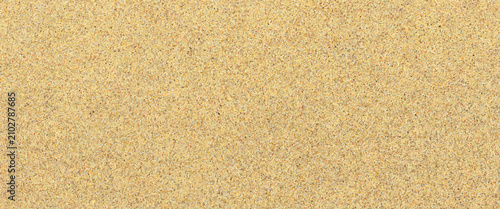 Bild auf Leinwand Fine textured granular background of light yellow sand