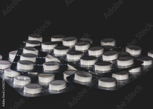 Canvas Print A blister pack of white paracetamol pills tablets with isolated on a neutral bac