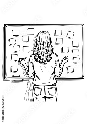 Woman brainstorming with sticky notes on a whiteboard in a creative workspace
