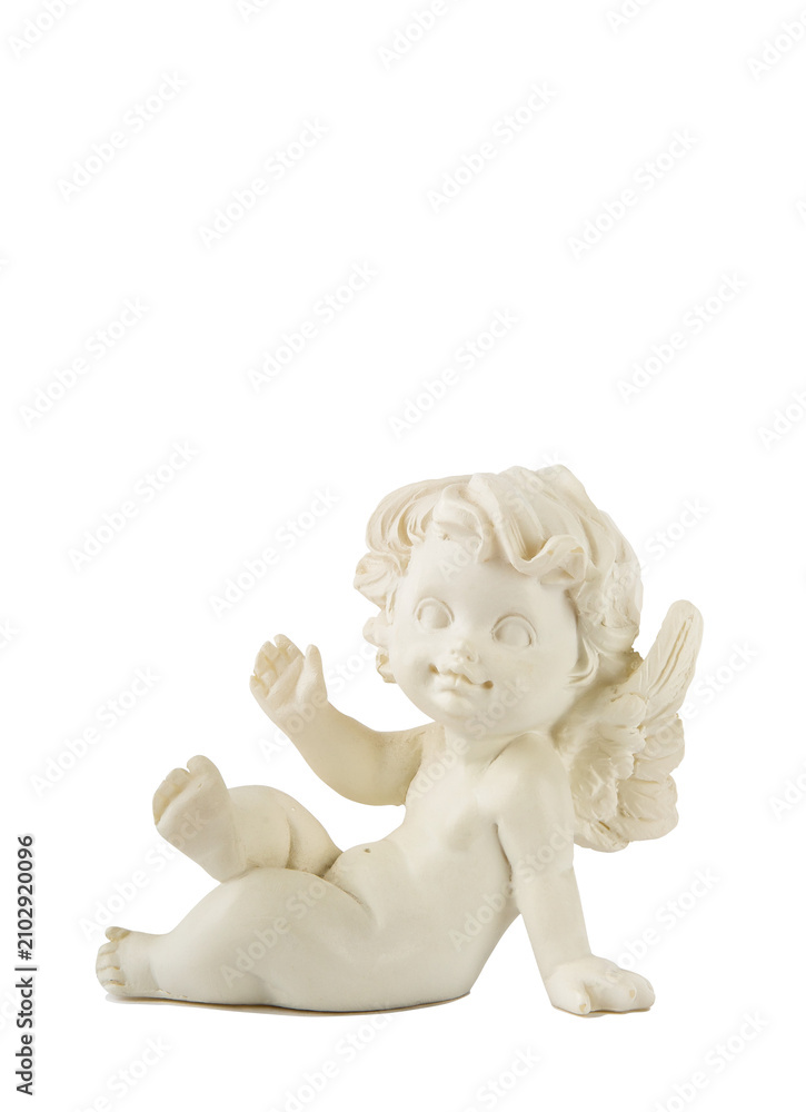 Obraz premium A little miniature statue of a white angel with wings on a white background, isolated on white background