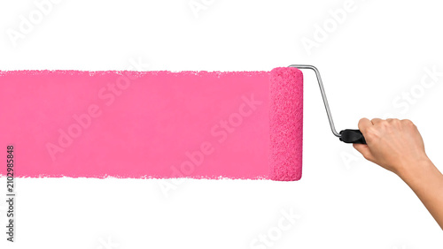 Hand using pink paint roller brush isolated on transparent background