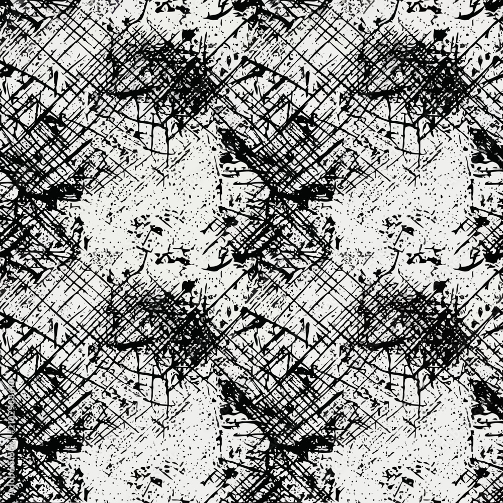 Obraz premium A seamless pattern of black ink splatters on white paper