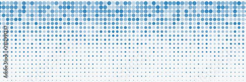 Tableau sur toile Abstract blue halftone dots gradient background with a smooth fade effect on a clean white backdrop
