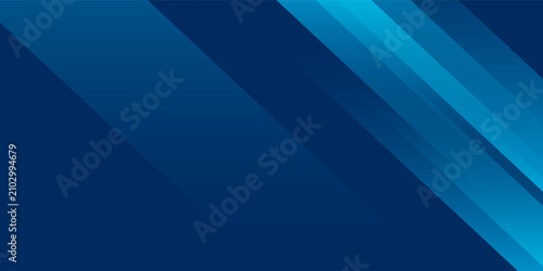 Fotografie Abstract blue geometric background featuring bright diagonal light streaks