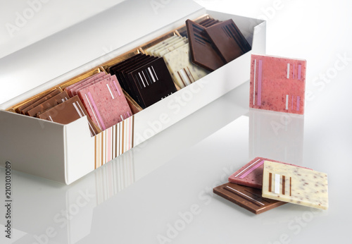 a box of chocolates with different types of chocolate