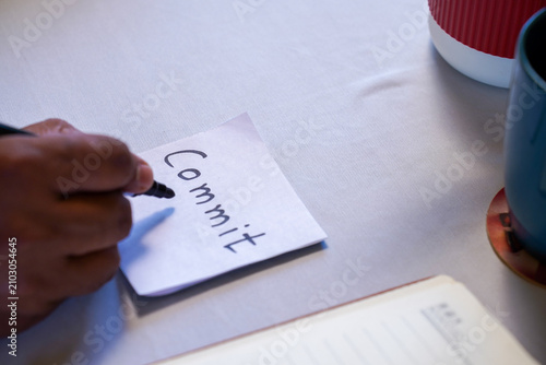Fototapeta Commit Action Plan Yellow Note