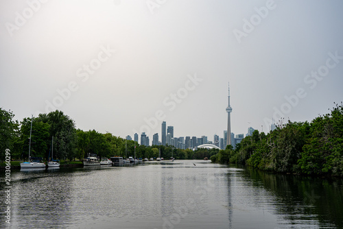 Canvas Print View of Toronto skyline across island waterway.