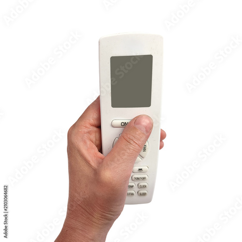Hand holding an air conditioner remote control isolated on transparent background. Climate control device for cooling, heating and smart home concepts, ideal for product catalogs and mockups.