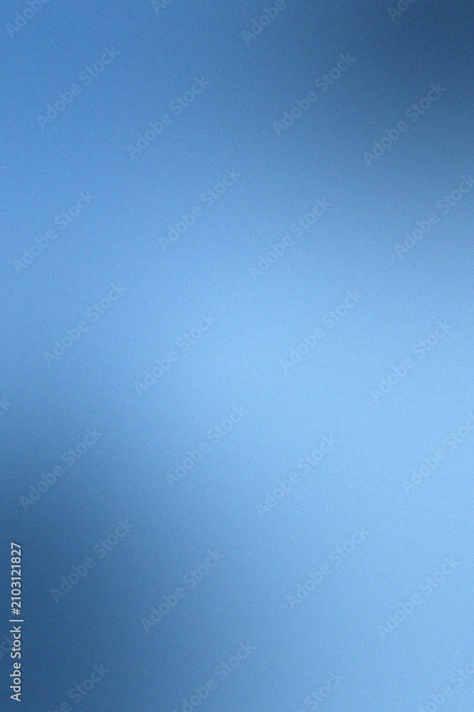 Naklejka premium Vertical deep blue gradient with soft lighting and smooth textured finish.