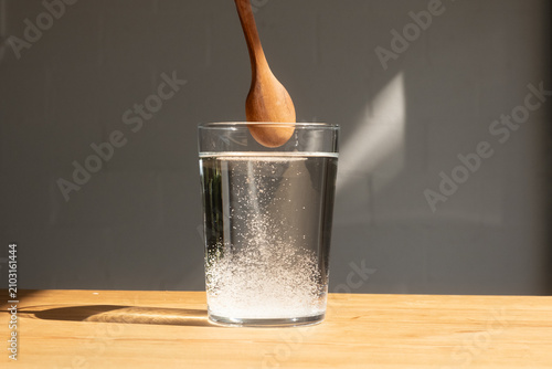 Stirring Supplement Powder In Water