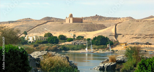 Nile cataract with tomb of  Aga Khan in the dessert near Aswan, Egypt
