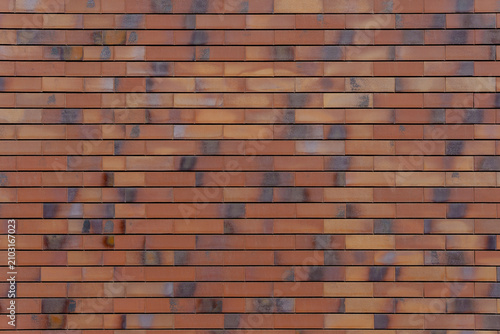 Fotografía Modern clinker brick wall with smooth rectangular bricks and dark thin seams