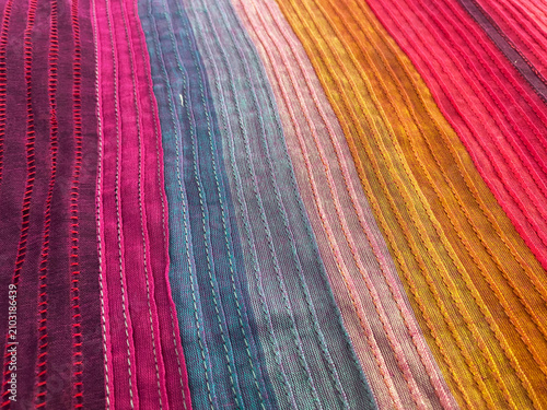 Photography Close-Up of Multicolor Hand Stitched Striped Cotton Fabric with Pintucks