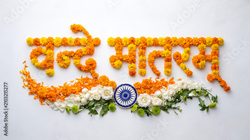  colorful Indian flag or Indian Tiranga  made with flower design and Hindi text  'Vande Matram' means 'salute to Mother land', Indian national day celebration concept