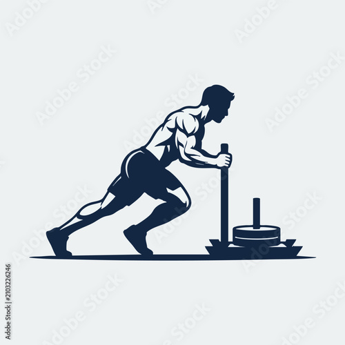 Photos Athletic man pushing a weighted prowler sled in gym training with exercise stren