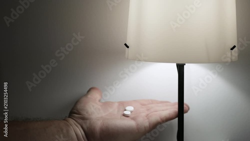 Blurred Shooting with a Suffering Person Taking Medical Pills. Suffering Elderly Taking Medication in Hospital.