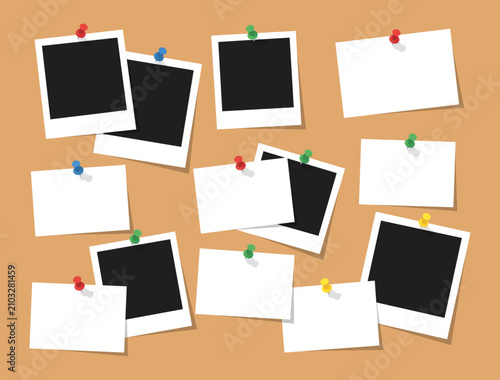 фотографія Blank instant photo frames and paper notes pinned to a corkboard