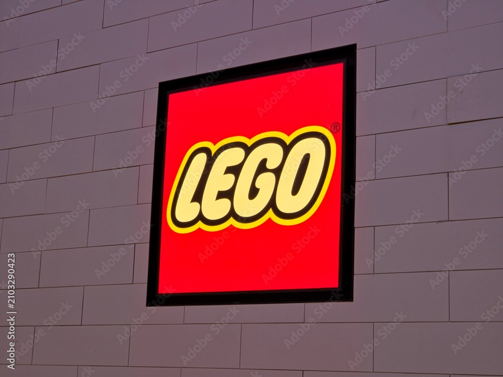 Fototapeta premium Illuminated LEGO Store Sign Mounted on a Brick-Patterned Wall on July 18 2026 in Bangkok, Thailand.