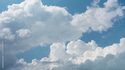 White cumulus clouds form in the blue sky. This convective activity indicates thermal updrafts for gliding and soaring. Perfect meteorology background for aviation and weather forecasting.