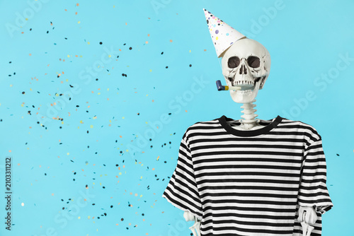 Human skeleton in party hat...