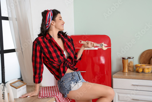 Beautiful pin-up woman with...