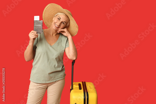 Mature woman with passport ...