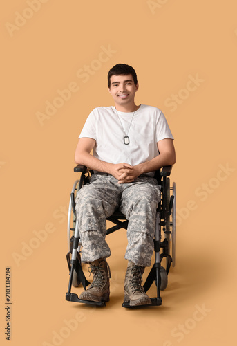 Young soldier in wheelchair...