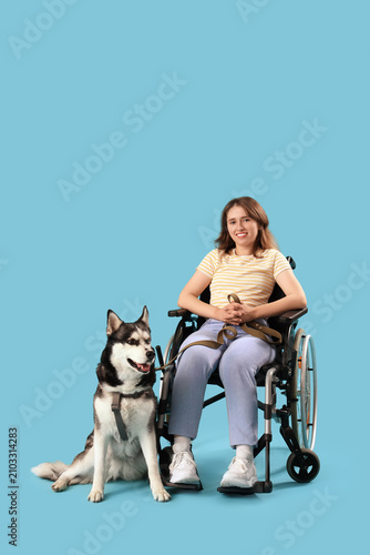 Young woman in wheelchair a...