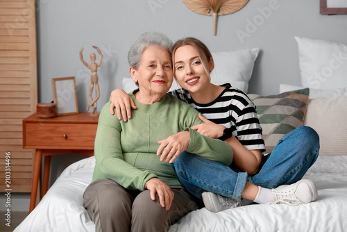 Young woman with her grandm...