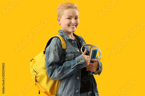 Female student with books a...