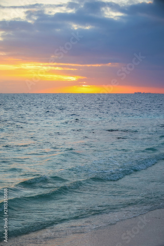Golden Sunset Over the Ocean Waves