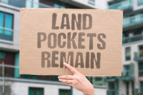 Fotografie "Land Pockets Remain" Small areas are still held