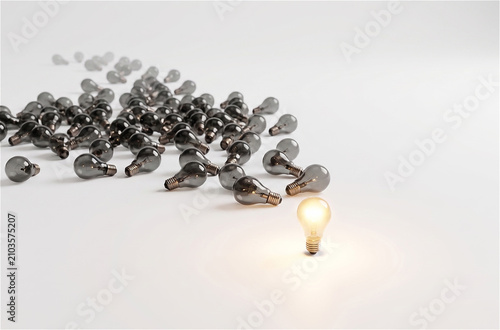 ingle Glowing Light Bulb Leading a Large Group of Unlit Bulbs on White Background. Conceptual metaphor for leadership, innovation, and being a trailblazer with copy space.