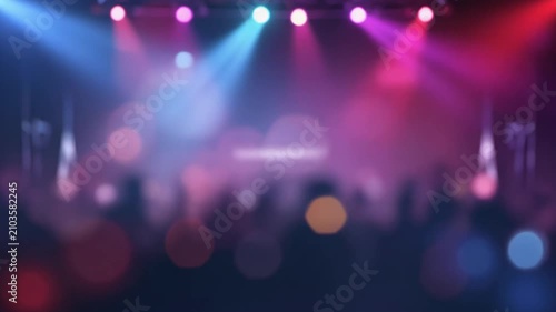 Abstract Blurred Concert Crowd and Colorful Stage Lights Bokeh Background