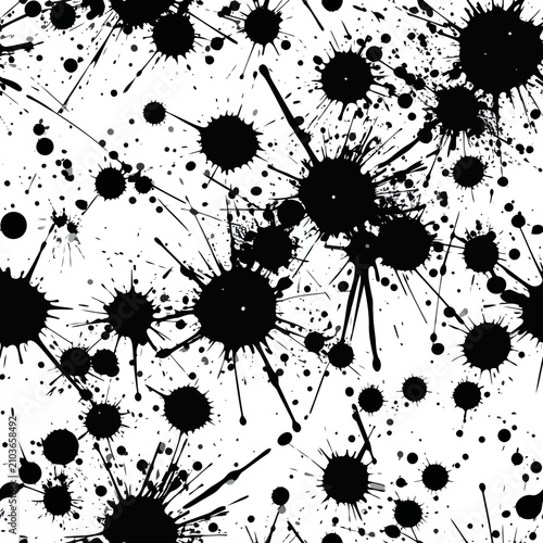 Black ink splatters on white background abstract pattern.