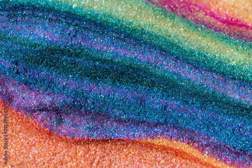 Obraz premium Abstract vibrant glitter texture with shimmering teal and orange waves for festive holiday backgrounds and creative design projects