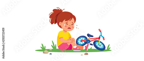 Foto Crying Child Fell Off Bicycle on Grass