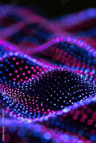 Swirling abstract network of glowing dots in vibrant blue and magenta