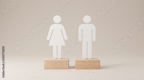 Gender equality concept represented by male and female human figures standing on identical wooden blocks