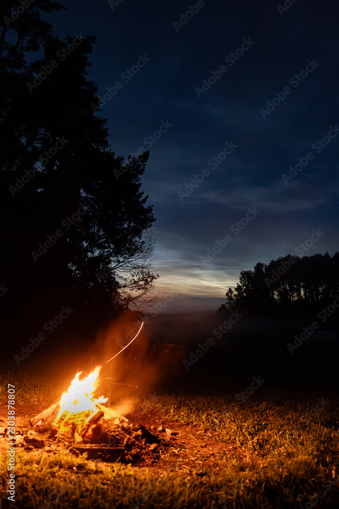 Fototapeta premium A Summer Evening by the Campfire.