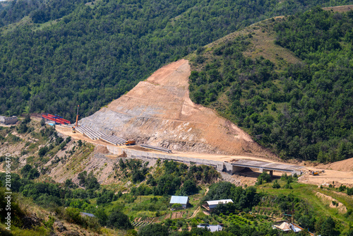 Canvastavla Hillside construction with heavy machinery and exposed soil