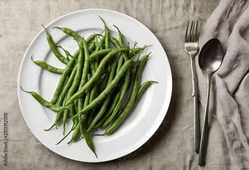 Fresh green beans on a whit...