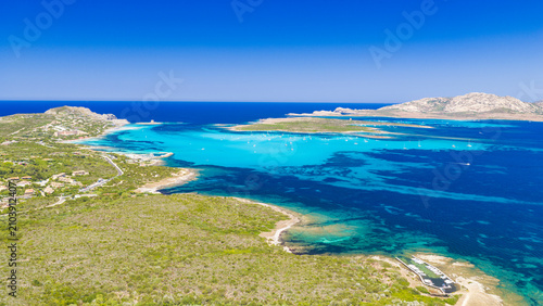 Konstfotografi Aerial panoramic view of La Pelosa Beach with its turquoise lagoon and crystal-c
