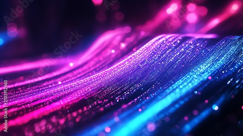 Abstract flowing lines of vibrant neon blue and magenta create a dynamic, futuristic, and energetic digital wave background