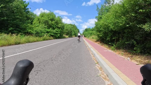 Gravel bicycle ride on the road in the summer season