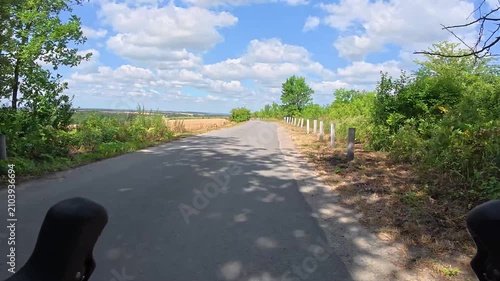 Gravel bicycle ride on the road in the summer season